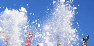 Group-of-children-playing-on-snow-in-winter-time-Shimla